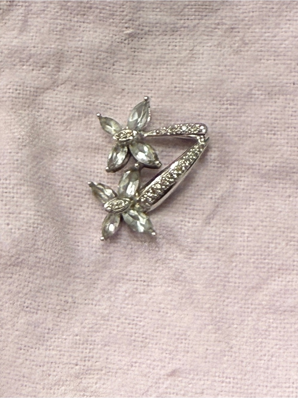 Sterling Silver and cupid’s zirconium necklace pennant.